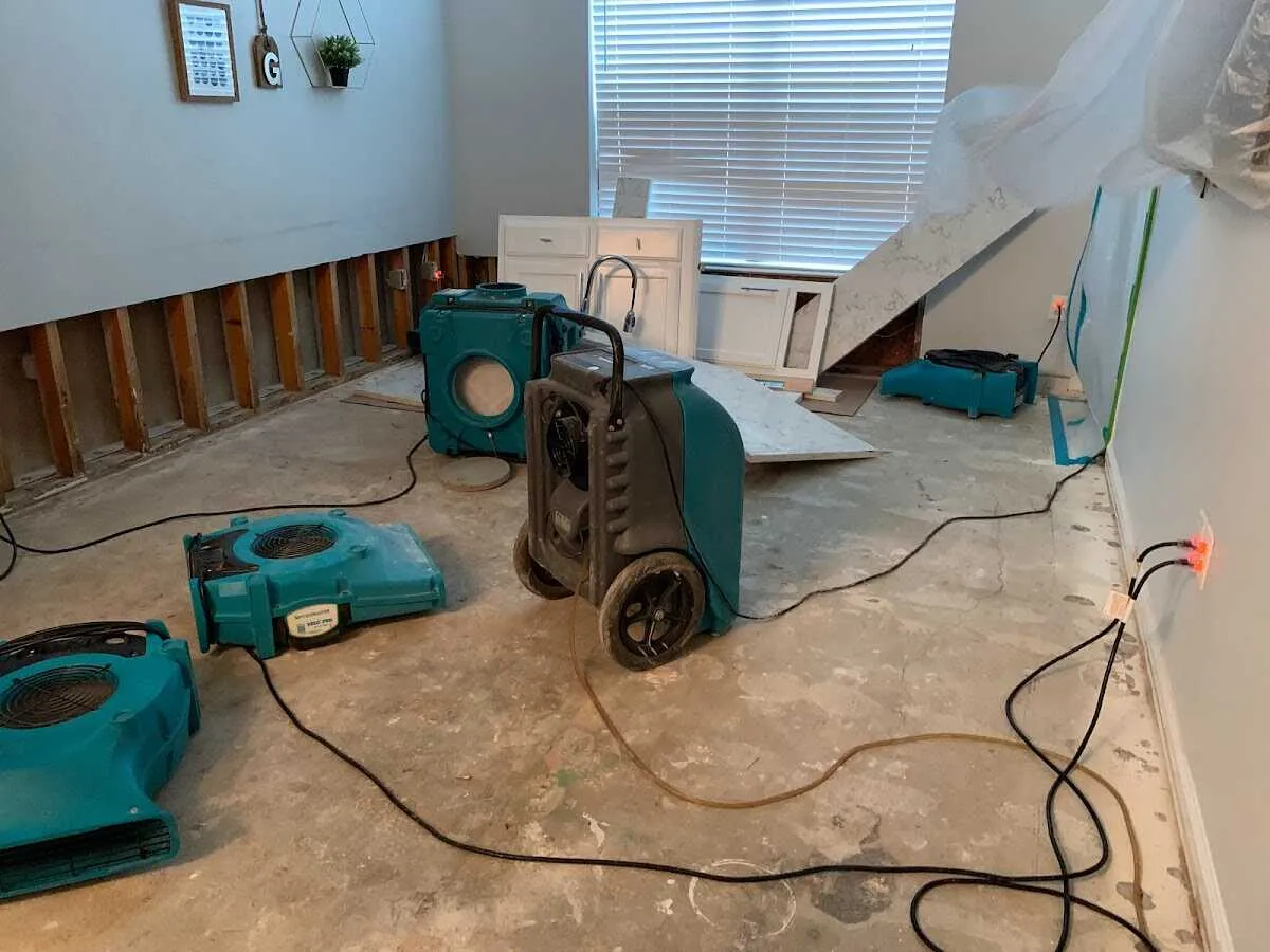 Dehumidifier in flood-cut room for Water Damage Restoration in Dayton